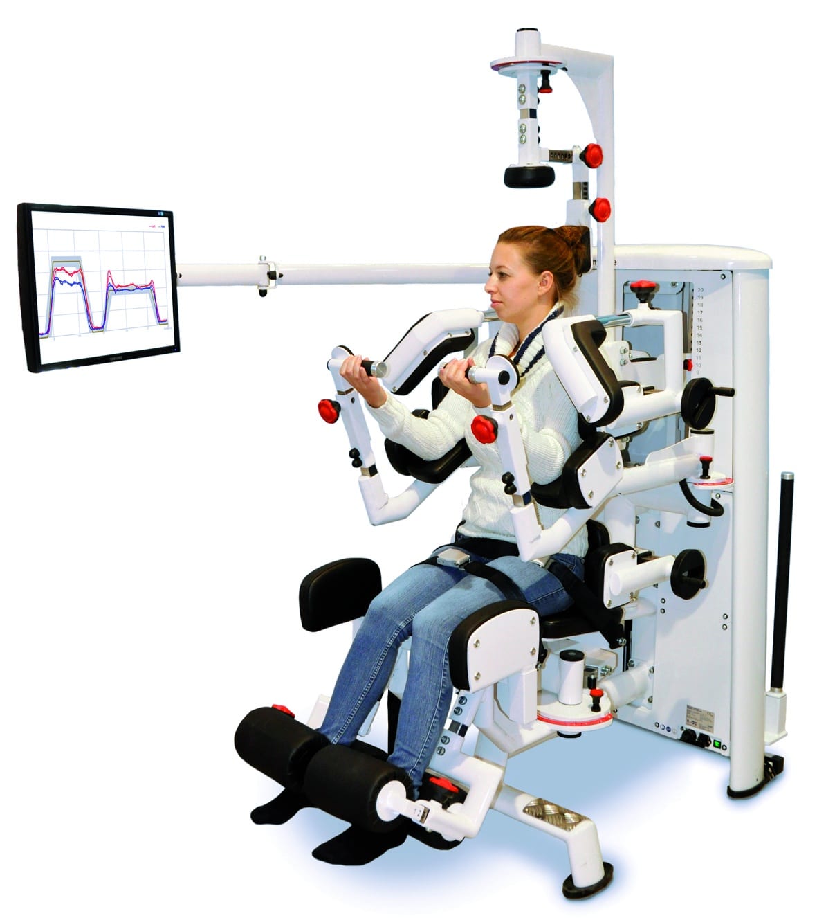A woman undergoing athletic testing, sitting in a chair while closely monitoring her performance on a monitor. | FCE Scan